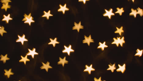 Background-Of-Christmas-Lights-In-The-Shape-Of-Stars-4